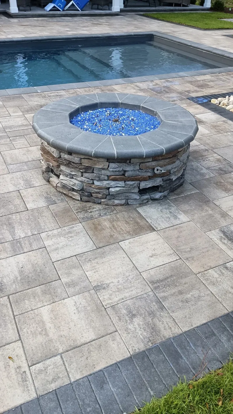 Brick fire pit by JW Masonry