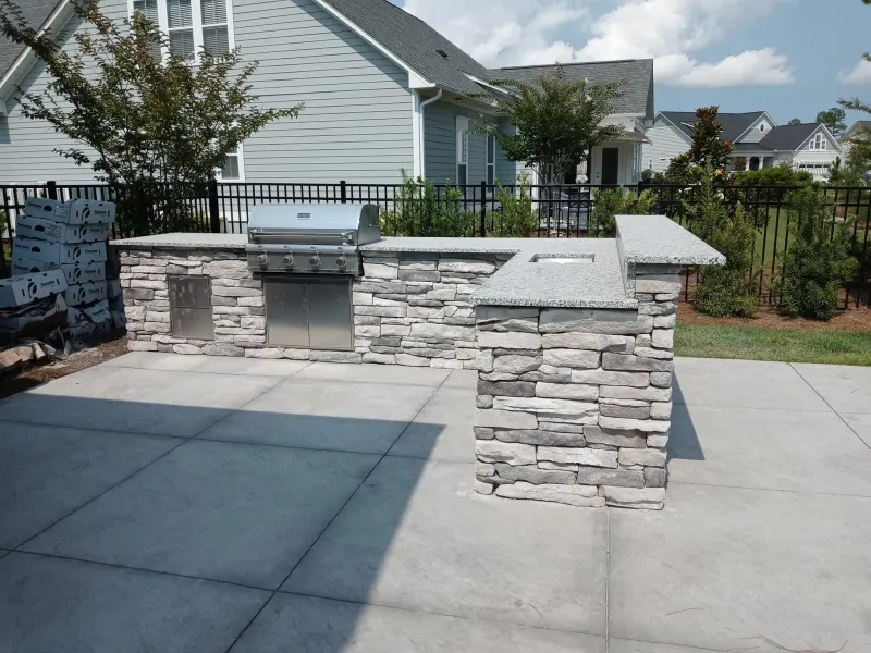 Brick grill and outdoor cooking area by JW Masonry