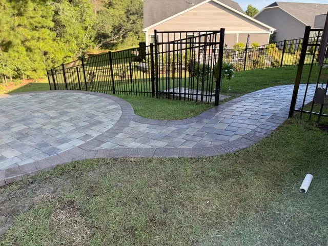 Fence and walkway by Cannon Fencing