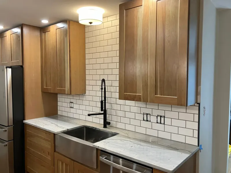 Indoor sink and vanity remodel by Dawson's Quality Home Services
